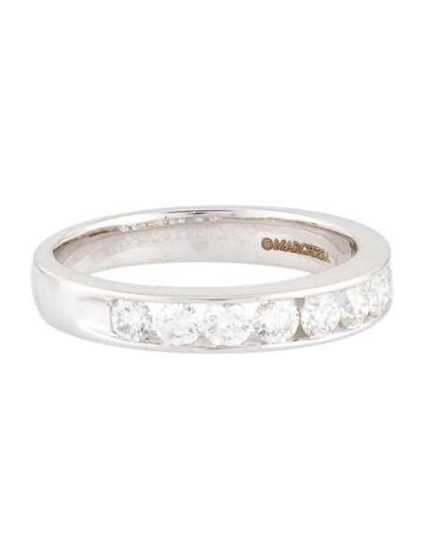 18k ariane wedding ring.